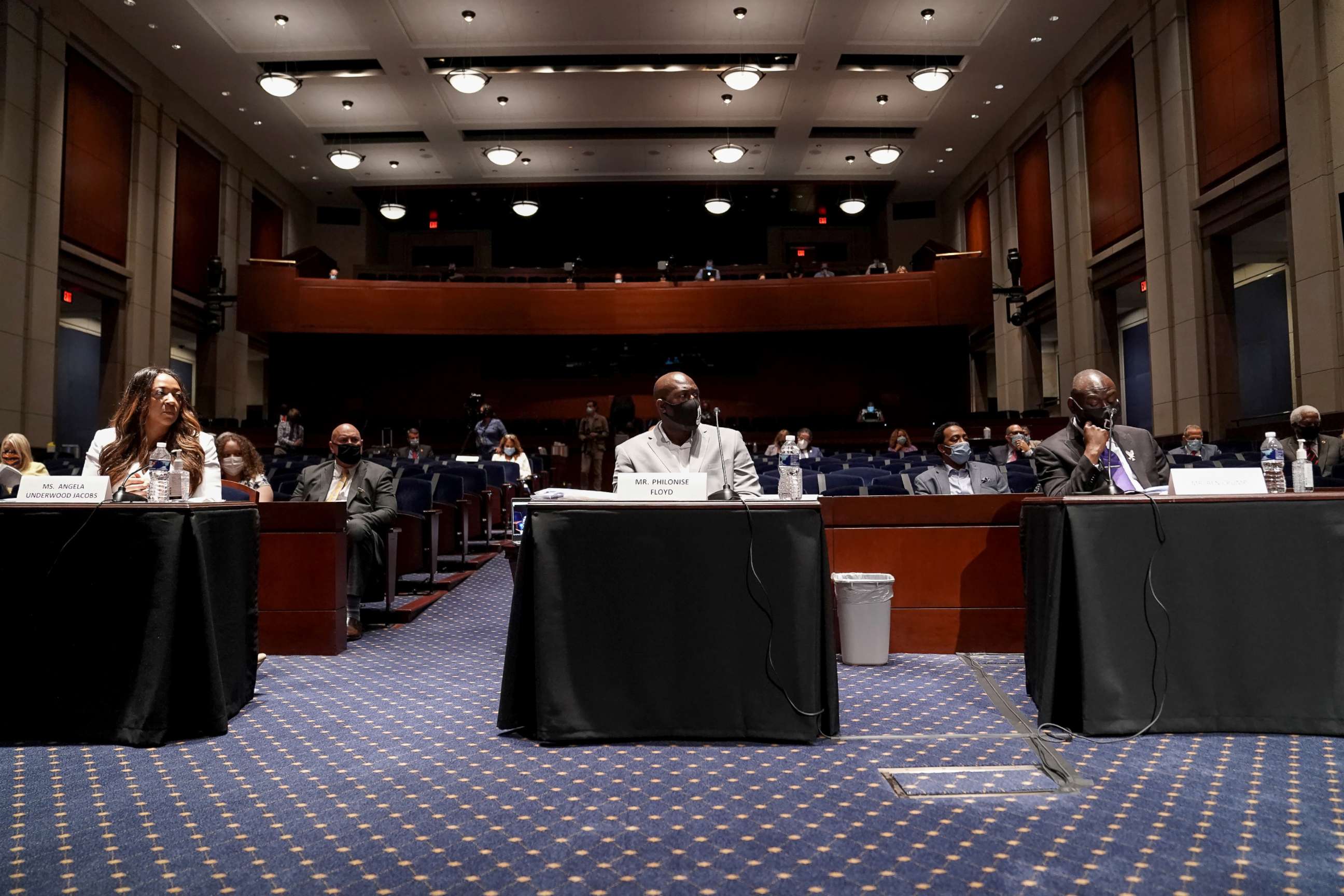 PHOTO: George Floyd's brother Philonise Floyd, civil rights attorney Benjamin Crump and Lancaster (California) City Council member Angela Underwood-Jacobs attend a House Judiciary Committee hearing in Washington.