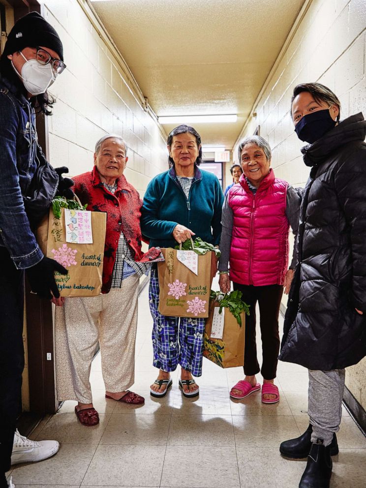 PHOTO: Yin Chang and Moonlynn Tsai deliver meals to seniors in their community amid the COVID-19 pandemic. 