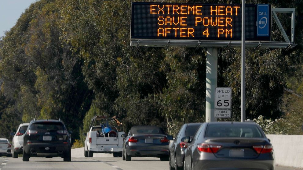 PHOTO: A sign along Interstate 580 West warns of excessive heat in Oakland, Calif., Sept. 6, 2022. Temperatures in Oakland reached 95 degrees.