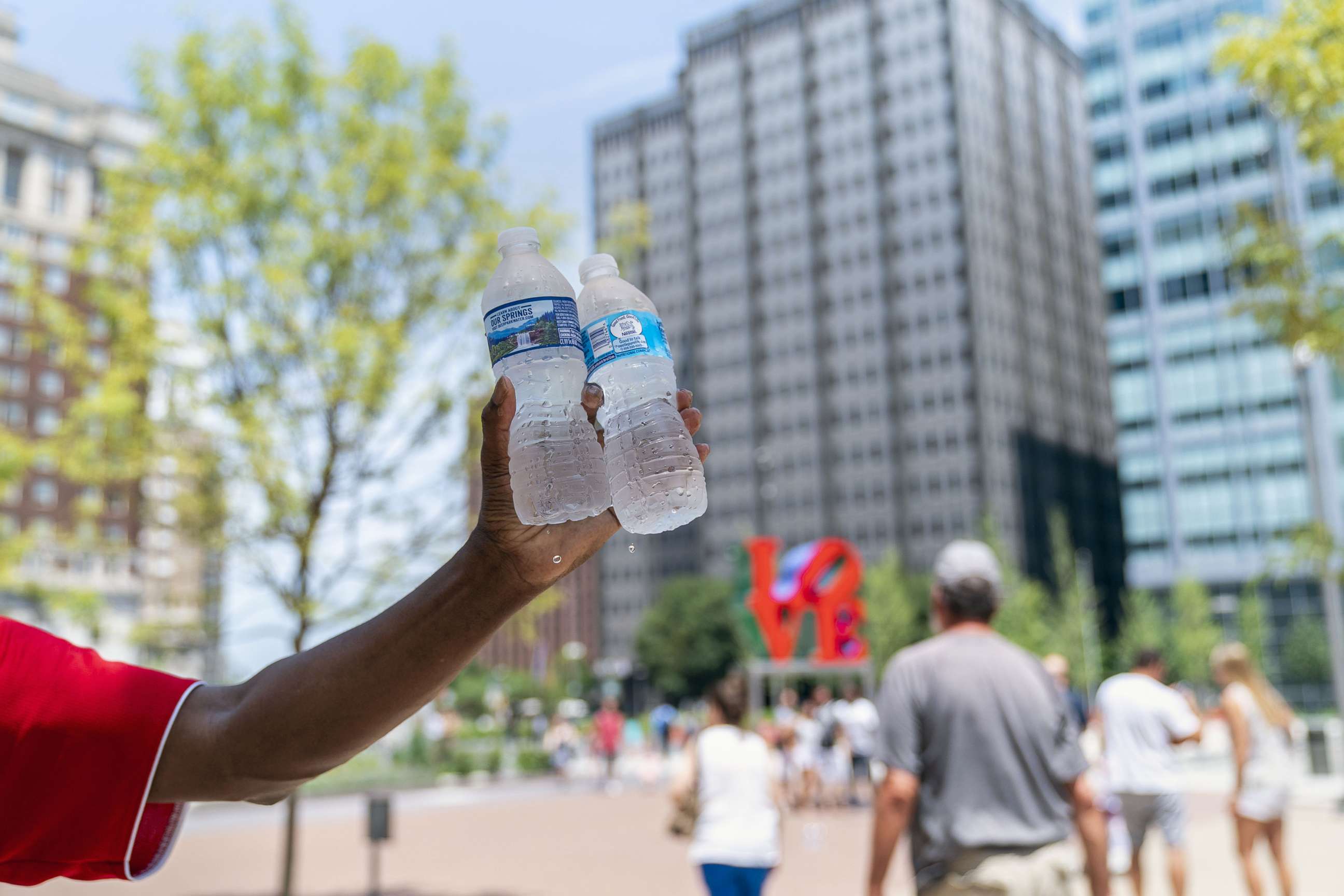 PHOTO: A man sells bottles of water in sweltering heat on July 1, 2018 in Philadelphia.