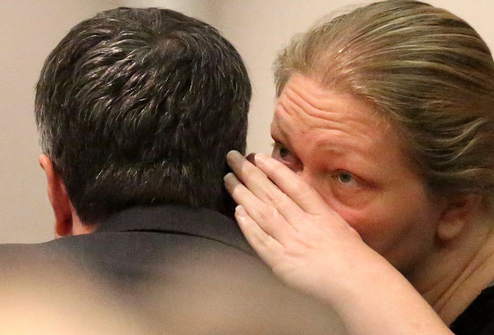 PHOTO: Tammy Moorer talks to her attorney Greg McCollum after being told not to interrupt the judge as her bond is denied again in the Horry County Courthouse on May 23, 2014 in Conway, S.C.