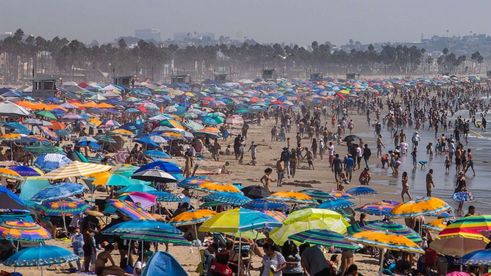 PHOTO: People gather on the beach on the second day of the Labor Day weekend amid a heatwave in Santa Monica, Caif., Sept, 6, 2020.