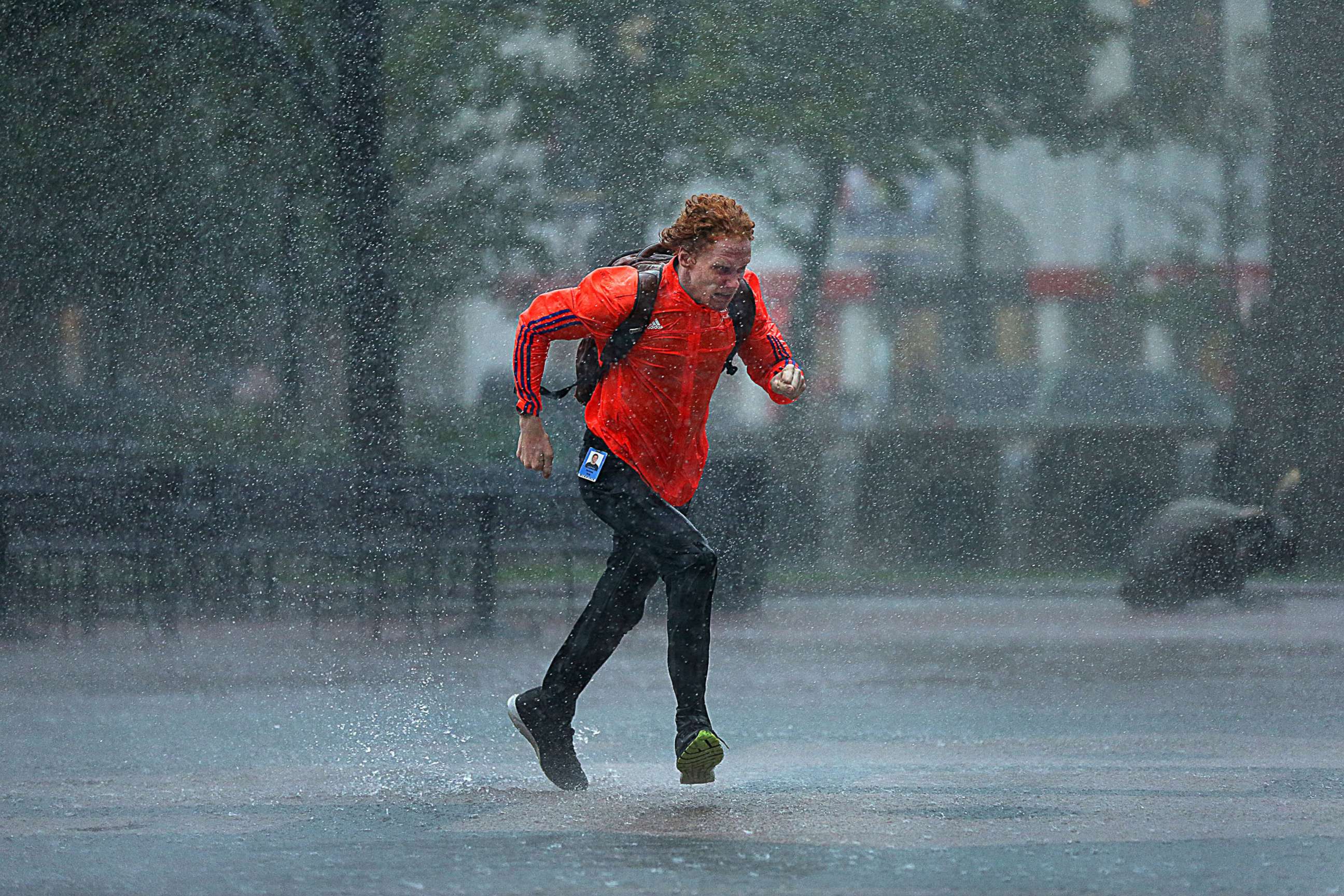 PHOTO: A pedestrian runs through heavy rain in Boston's Copley Square on Sep. 18, 2018.