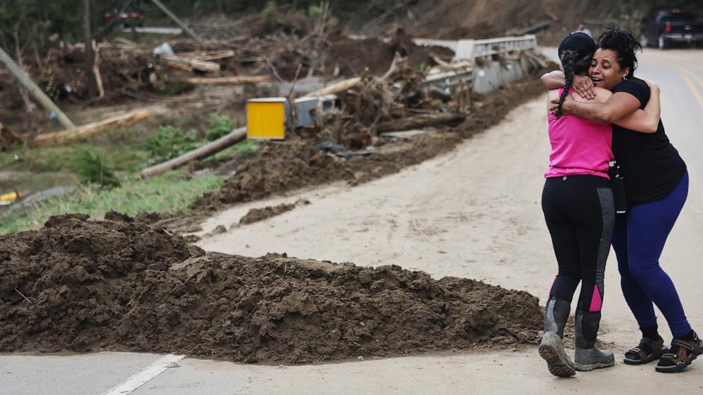 PHOTO: Tammie Mance (R) hugs her boss Liesl Steiner, whose home was destroyed, as they see each other for the first time since the storm in the aftermath of Hurricane Helene flooding, Oct. 3, 2024, in Black Mountain, North Carolina. 