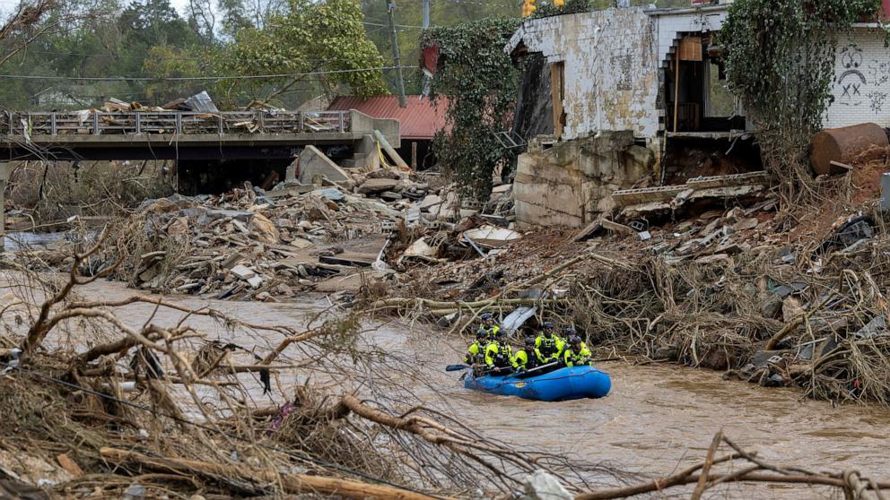 PHOTO: A rescue team paddles down the Swannanoa River after the remnants of Hurricane Helene caused widespread flooding, downed trees, and power outages in western North Carolina, Sept. 29, 2024.