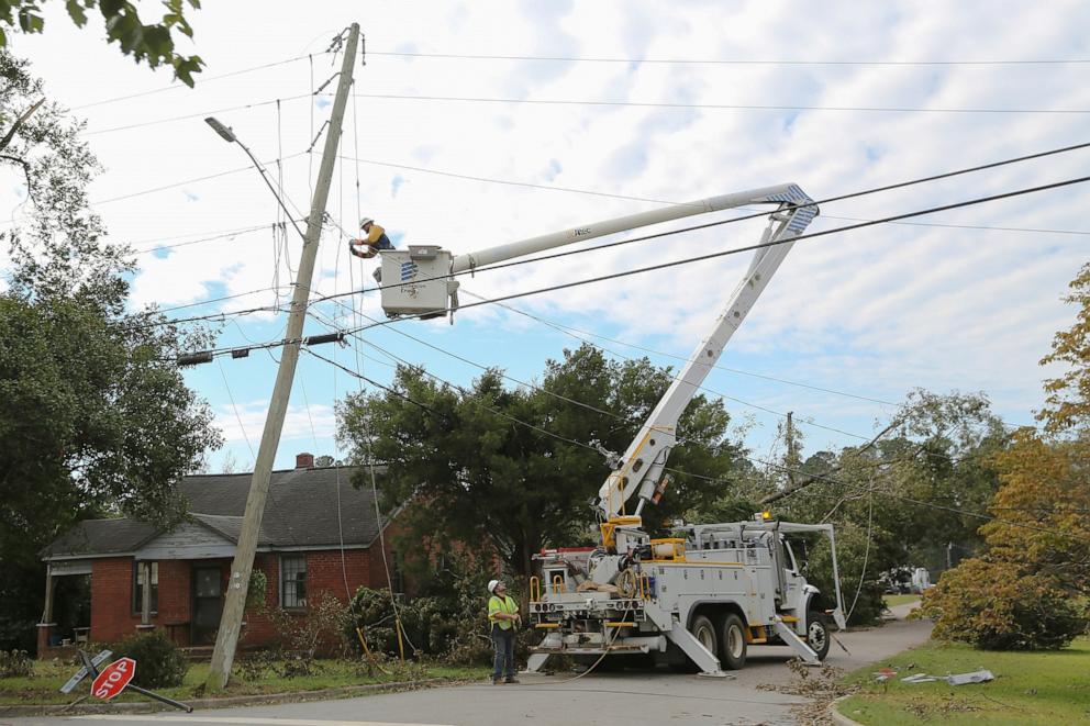 PHOTO: A Dominion Energy lineman works on a power line in the aftermath of Hurricane Helene Sunday, Sept. 29, 2024, in North Augusta, S.C.