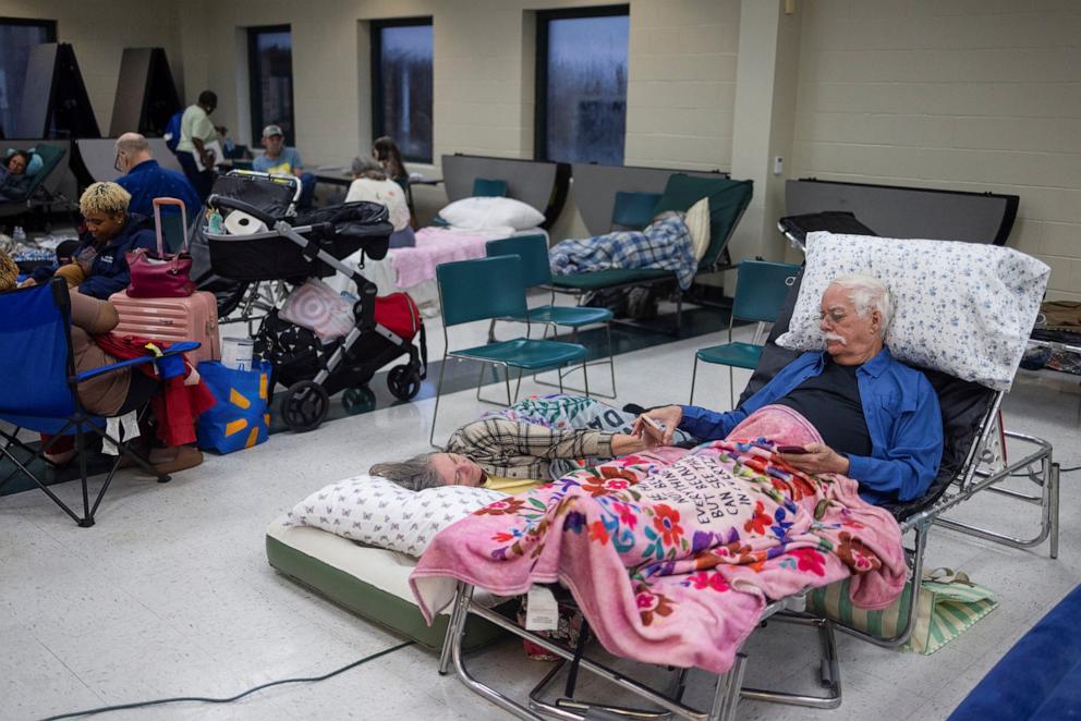 PHOTO: Donald Draughon and his wife Vicki wait for the arrival of Hurricane Helene at Lincoln High School, which was opened as a shelter in Tallahassee, Fla., Sept. 26, 2024. 