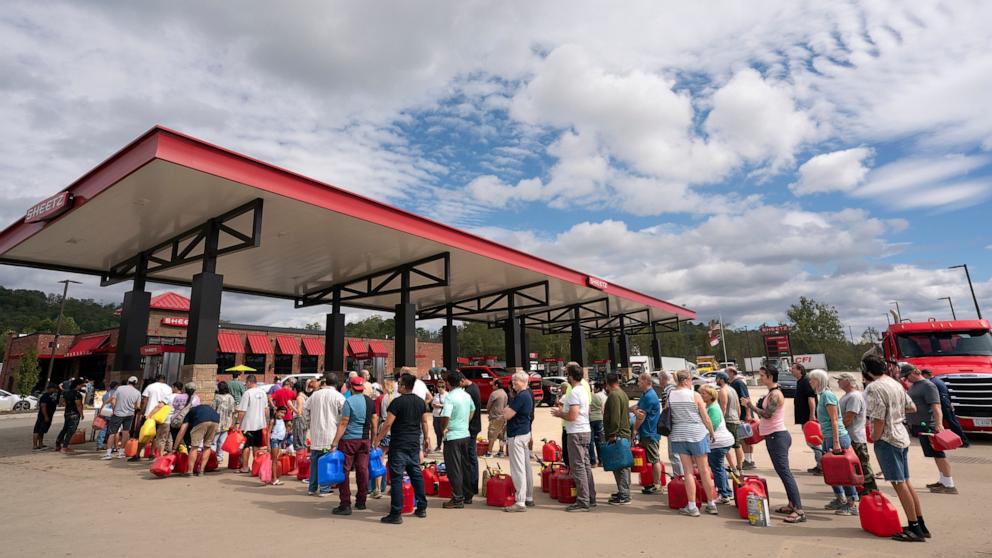 PHOTO: People wait in line for gasoline in the aftermath of Hurricane Helene on Sept. 29, 2024 in Fletcher, N.C.