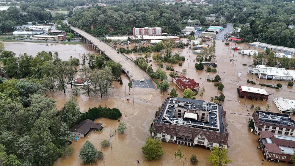 PHOTO: Flooding caused by the storm that started as Hurricane Helene covering streets in Asheville, N.C.,  Sept. 2024.