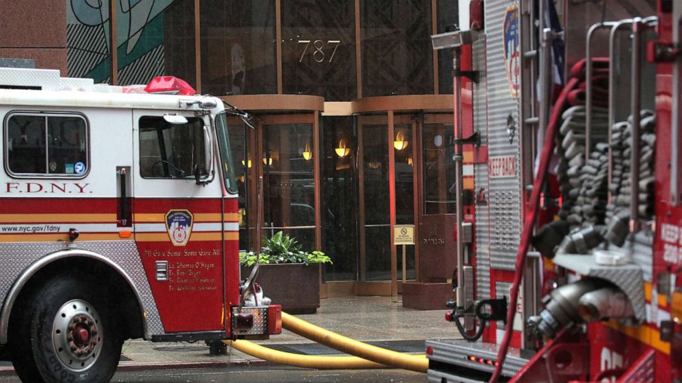 PHOTO: New York City Fire Department trucks are seen outside 787 7th Avenue in midtown where a helicopter was reported to have crashed, June 10, 2019. 
