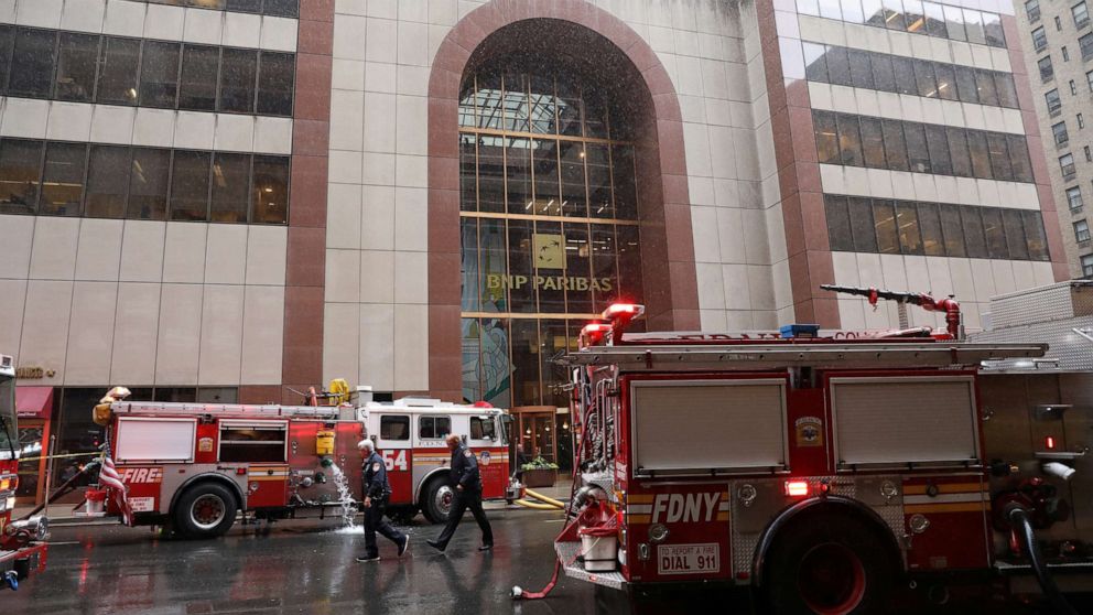 PHOTO: New York City Fire Department trucks are seen outside 787 7th Avenue in midtown where a helicopter was reported to have crashed in New York, June 10, 2019. 