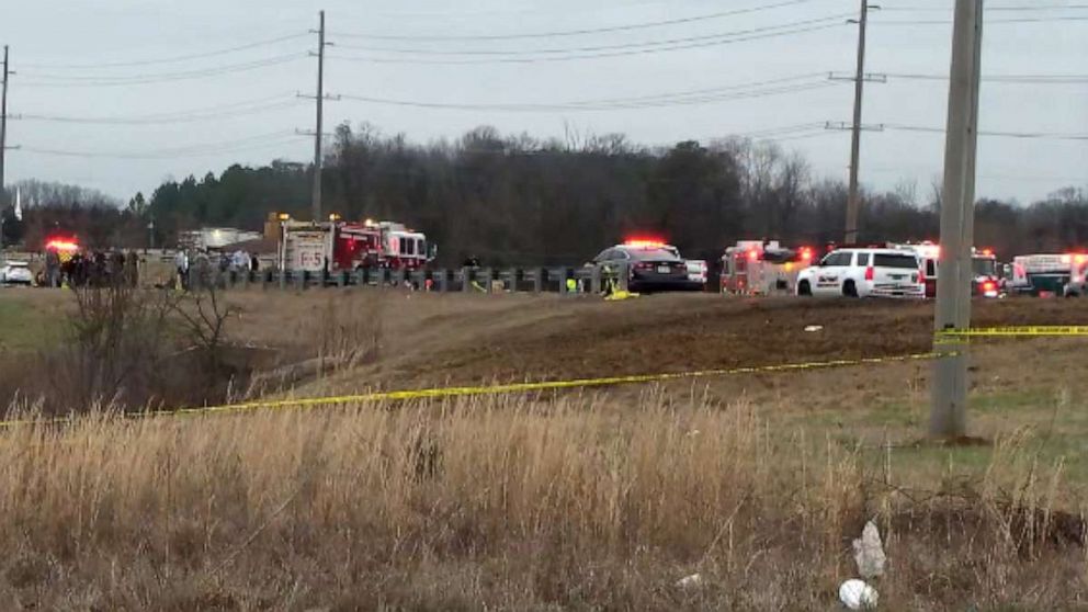 PHOTO: First responders on the scene of a UH-60 Black Hawk helicopter crash on Alabama 53 near the intersection of Burwell Road in Madison County, Ala., Feb. 15, 2023.