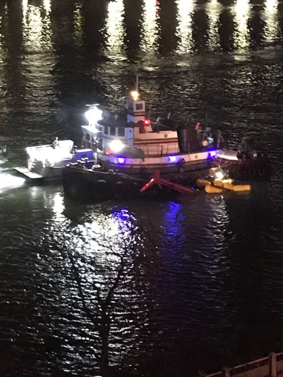 PHOTO: A boat on the scene where a helicopter crashed into the East River in New York City, March 11, 2018. 