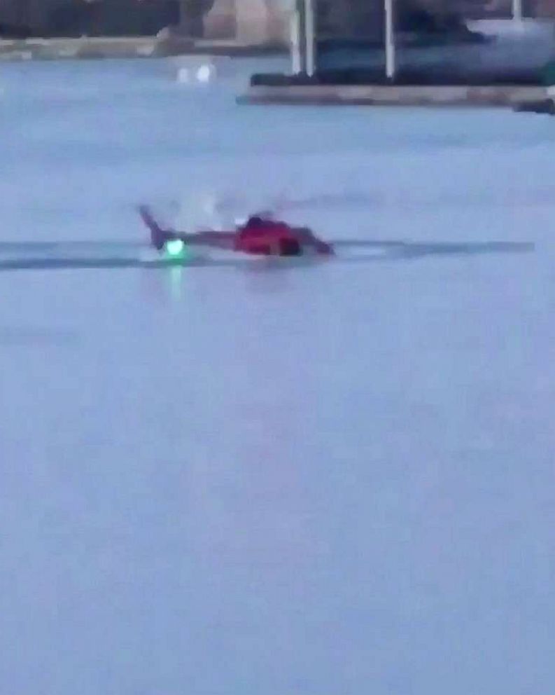 PHOTO: A helicopter crashed in New York City's East River, March 11, 2018, in a still image from video posted to Twitter.