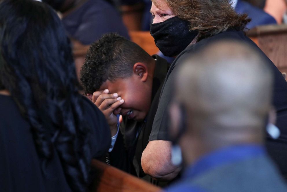 PHOTO: Tybre Faw becomes emotional after the reading of John Lewis' favorite poem "Invictus," during Lewis' funeral at Ebeneezer Baptist Church in Atlanta, July 30, 2020.