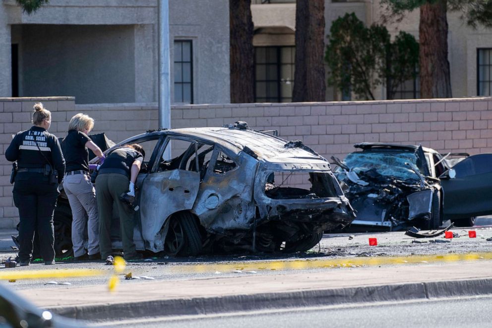 PHOTO: Las Vegas Metro Police investigators work at the scene of a fatal crash involving Las Vegas Raiders wide receiver Henry Ruggs III, Nov. 2, 2021, in Las Vegas.