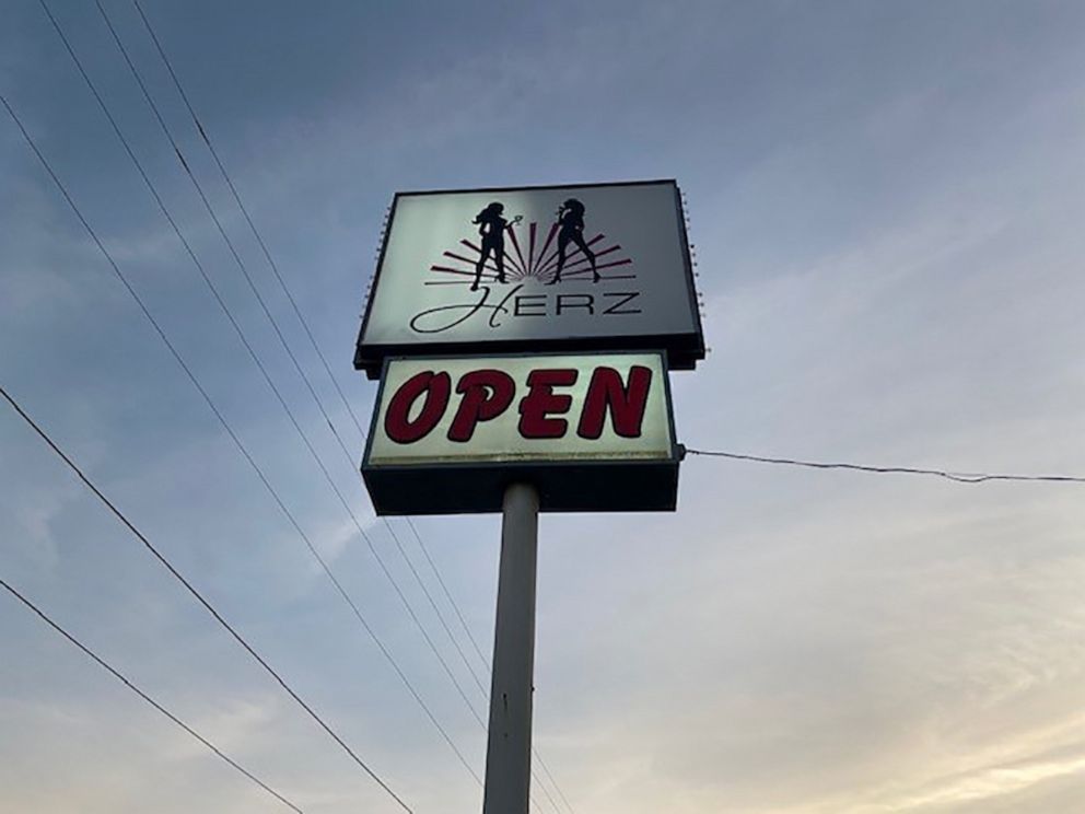 PHOTO: The sign for Herz, a lesbian bar in Mobile, Ala., one of the few still open in the south.