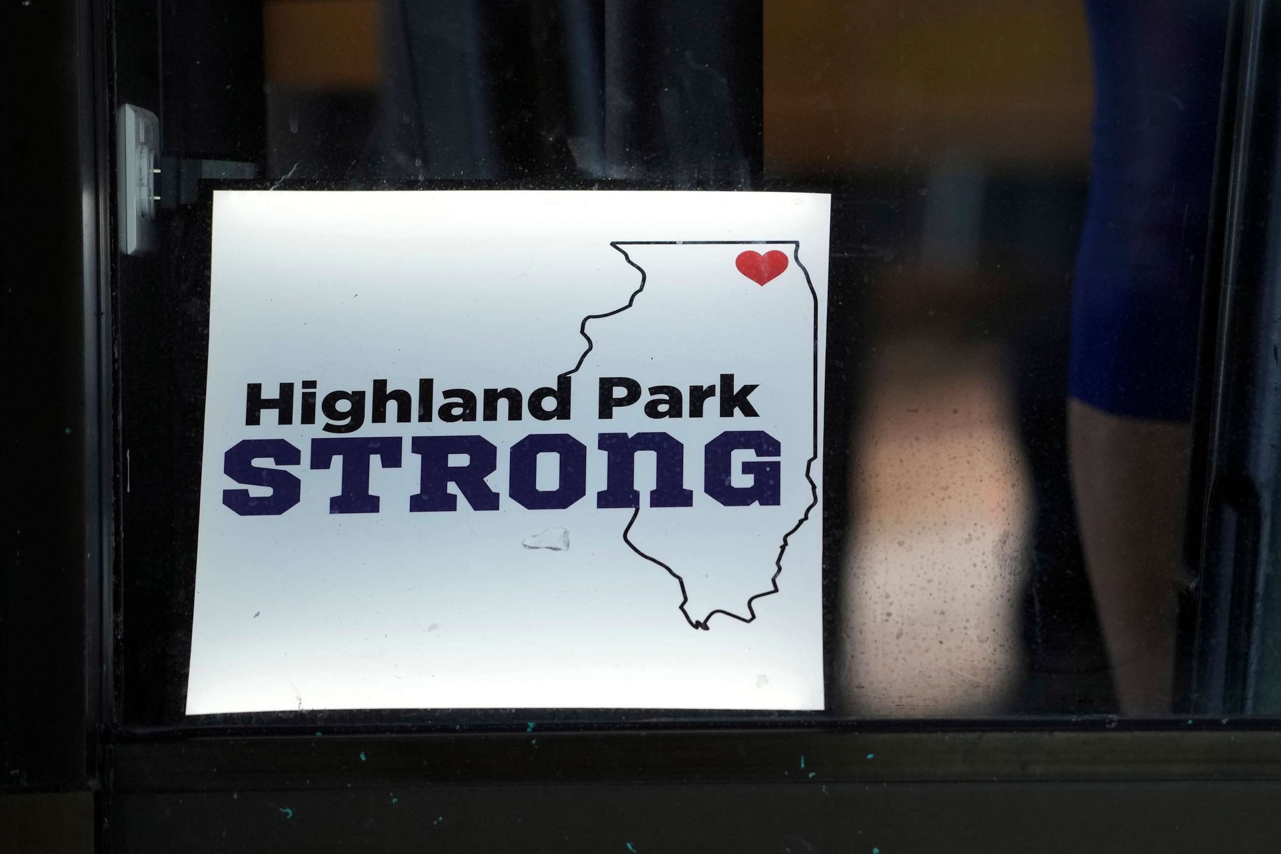 PHOTO: A Highland Park Strong sign is displayed at a restaurant in Highland Park, Ill., July 3, 2023.