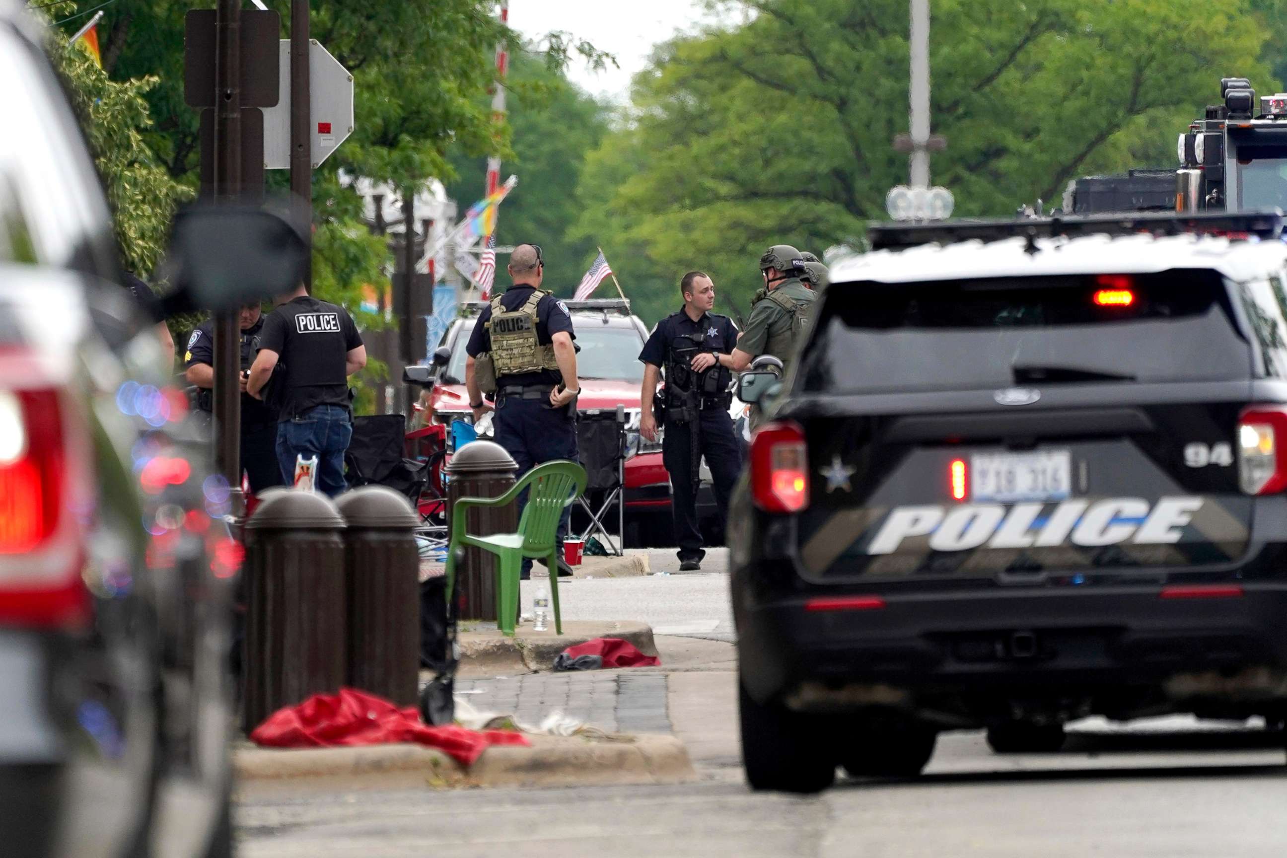 PHOTO: Law enforcement search in a building after a mass shooting at the Highland Park Fourth of July parade in downtown Highland Park, a Chicago suburb on Monday, July 4, 2022.