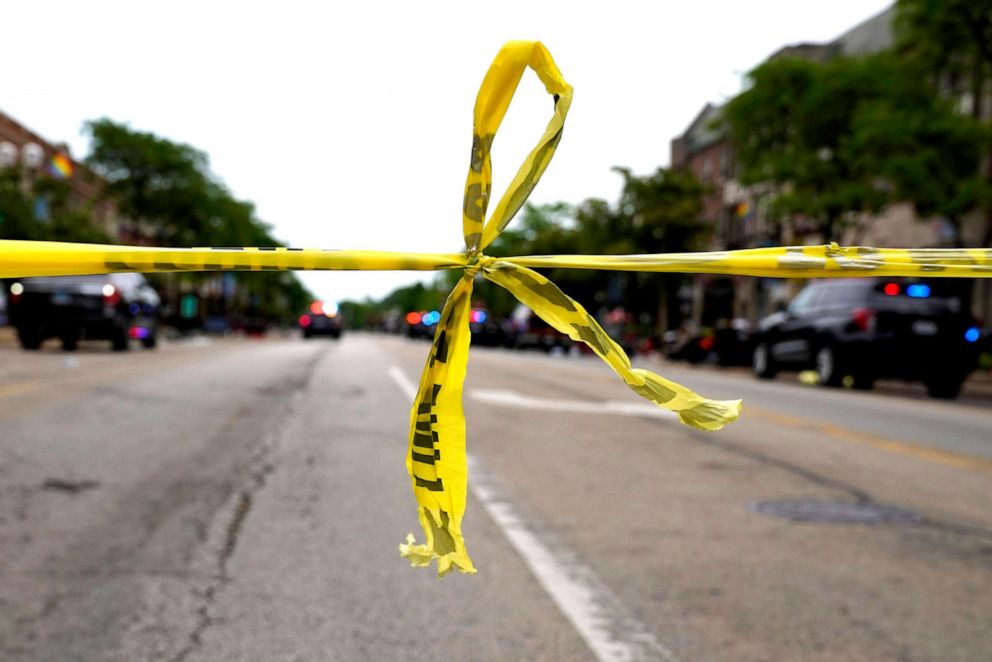 PHOTO: Police tape hangs at corner of Central Avenue and Green Bay Rd., in Highland Park, a Chicago suburb, Monday, July 4, 2022, after a mass shooting at Highland Park Fourth of July parade. 