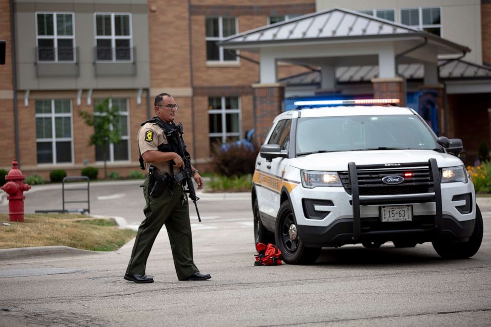 PHOTO: First responders work the scene of a shooting at a Fourth of July parade on July 4, 2022 in Highland Park, Illinois. At least six people were killed, according to authorities.