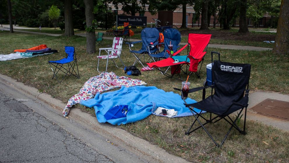 PHOTO: Chairs and blankets sit abandoned after a shooting at a Fourth of July parade on July 4, 2022 in Highland Park, Illinois. At least six people were killed, according to authorities.