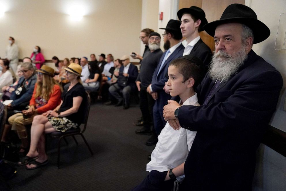 PHOTO: Participants listen during an event of unity and healing at the Central Avenue Synagogue-Chabad in Highland Park for the victims of Monday's Highland Park's Fourth of July parade in Highland Park, Ill., July 7, 2022.