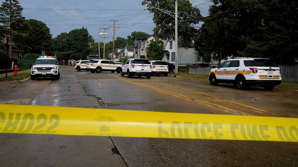 PHOTO: Police investigate outside the home of the mother of the man detained after a mass shooting at a Fourth of July parade route in the Chicago suburb of Highland Park, Ill., on July 4, 2022.