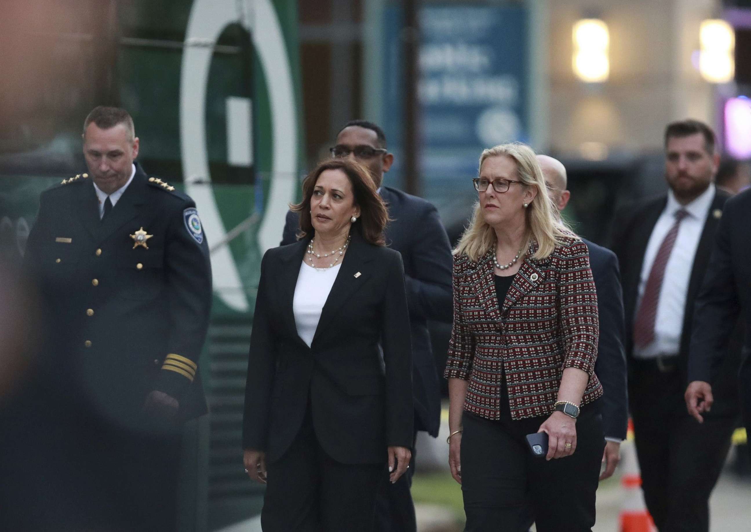 PHOTO: Vice president Kamala Harris, left, walks with Highland Park, Ill., mayor Nancy Rotering as Harris arrives to visit the site of the mass shooting at the Highland Park July 4th parade, in Highland Park, Ill, July 5, 2022.