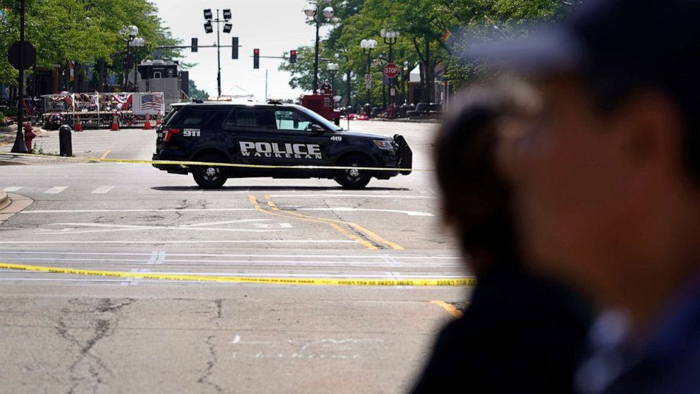 PHOTO: A police vehicle blocks the road on Central avenue where multiple people were killed during Fourth of July celebrations, July 7, 2022, in Highland Park, Ill.