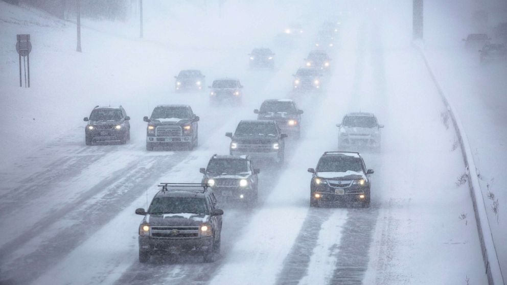 PHOTO: Vehicles are seen during a heavy snowstorm on a highway in St. Paul, Minnesota, Feb. 22, 2022.
