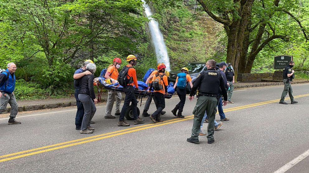 PHOTO: Search and rescue crews wheel missing Portland hiker Joe Dean to the command post after locating him on May 10, 2021, near the Horsetail Falls Trail in Oregon.