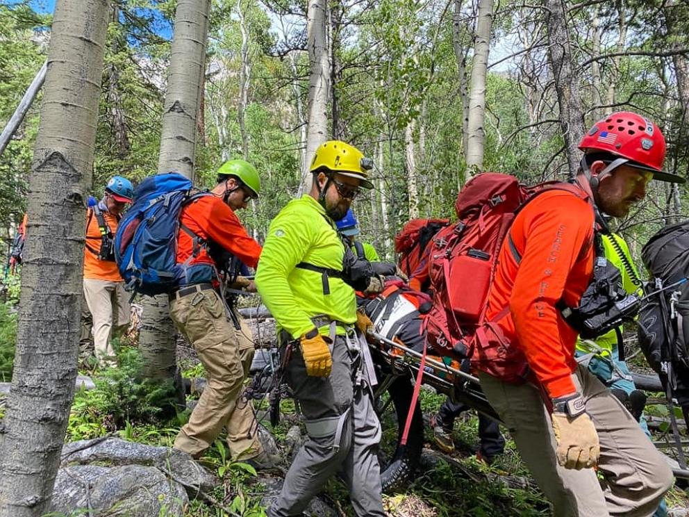 PHOTO: Volunteer rescuers carry hiker Steve Stephanides, who became disoriented and lost on a 14,230-foot mountain in central Colorado after his work colleagues allegedly left him behind alone on an office charity hiking trip.