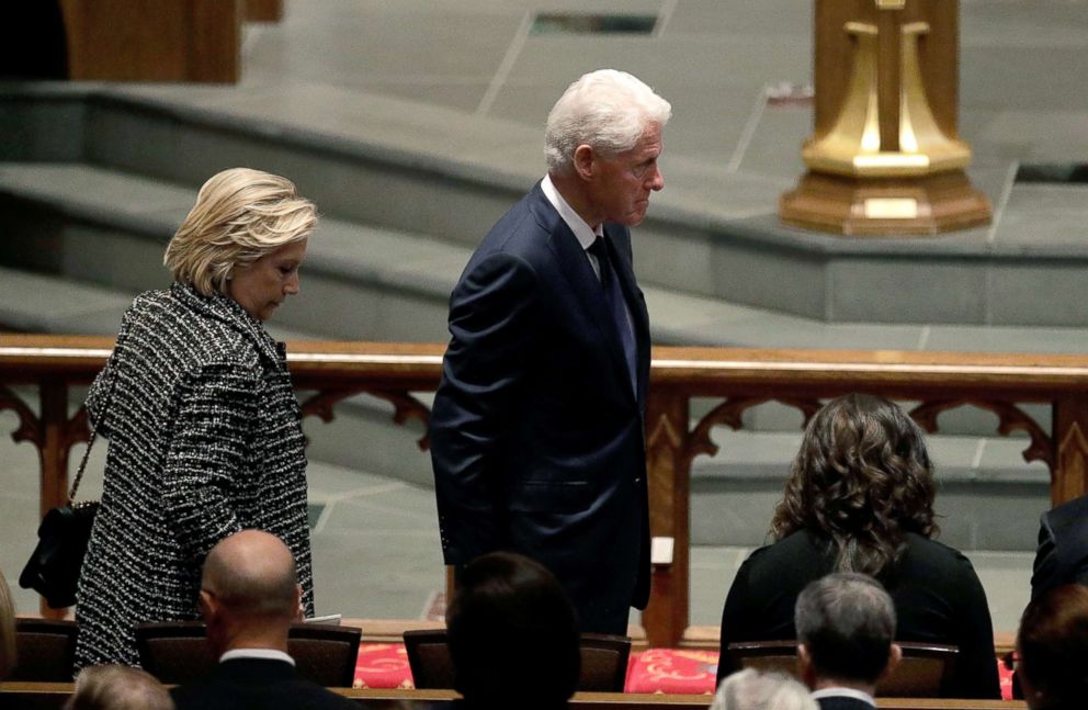 PHOTO: Accompanied by his wife, Hillary Clinton, left, former President Bill Clinton arrives at St. Martin's Episcopal Church for a funeral service for former first lady Barbara Bush, April 21, 2018 in Houston.