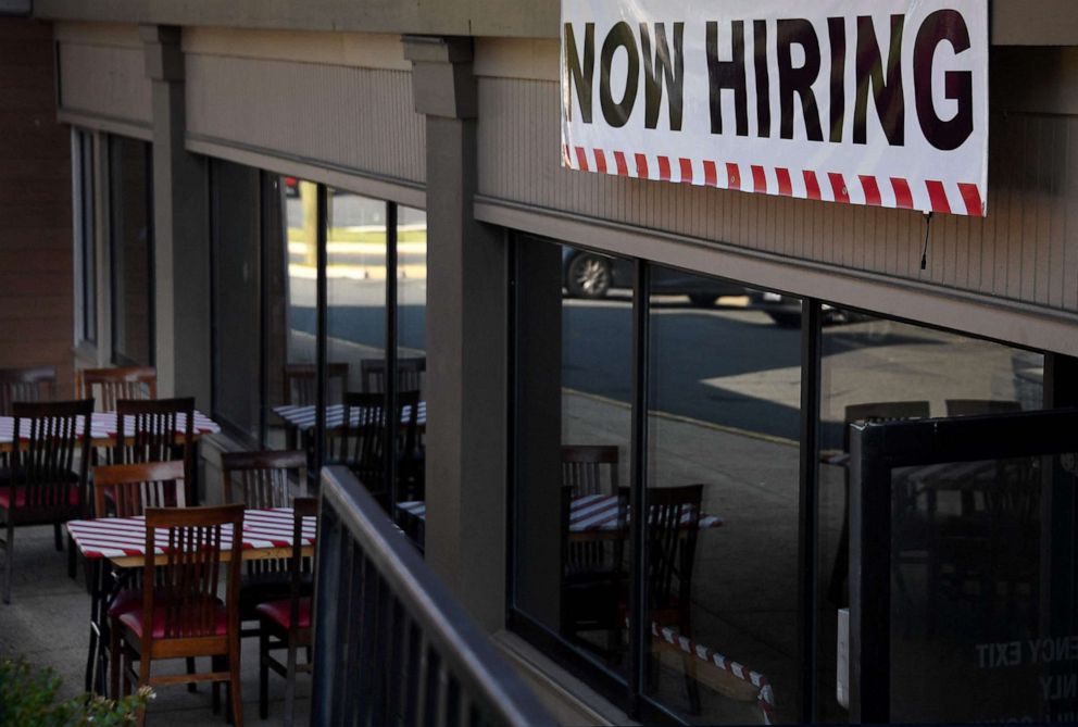 PHOTO: A "Now Hiring" sign is posted outside a restaurant in Arlington, Va.