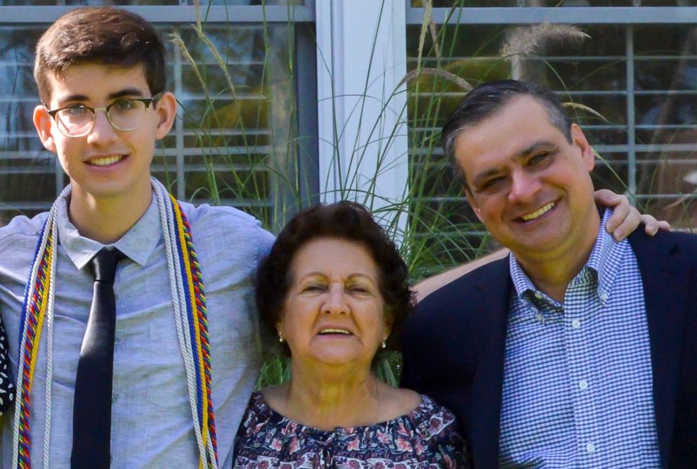 PHOTO: Alex Del Dago stands with his Abuela and father just before his high school graduation. At this point, he had taken four years of Spanish and was able to have substantial conversations with his Abuela, who was born and raised in Cuba. 