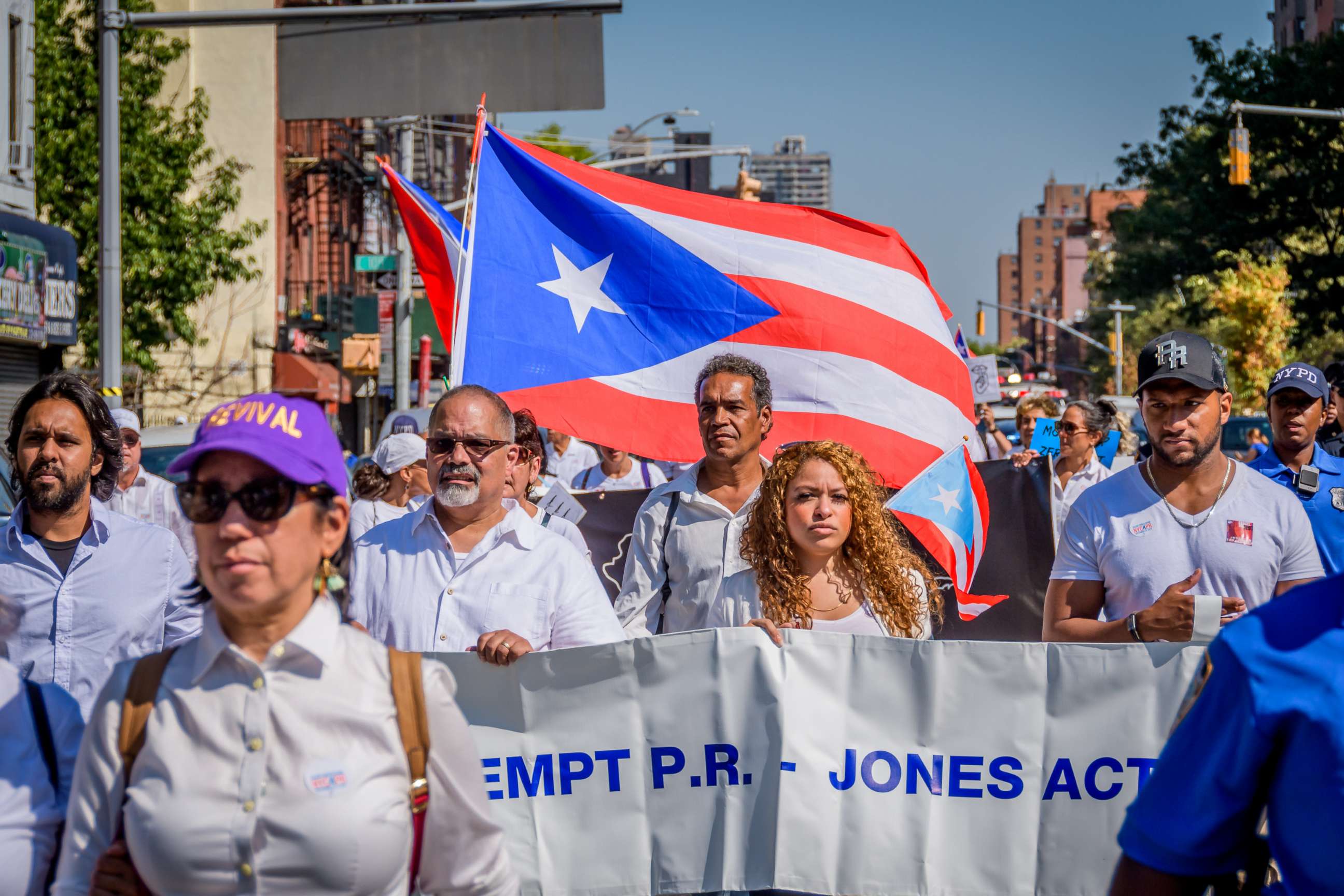 PHOTO: Puerto Ricans dressed in white march in protest of the U.S. treatment of Puerto Rico in the aftermath of Hurricane Maria, in New York, Sept. 22, 2019.