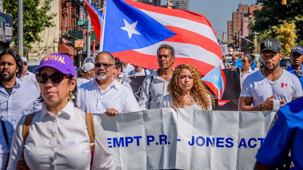 PHOTO: Puerto Ricans dressed in white march in protest of the U.S. treatment of Puerto Rico in the aftermath of Hurricane Maria, in New York, Sept. 22, 2019.