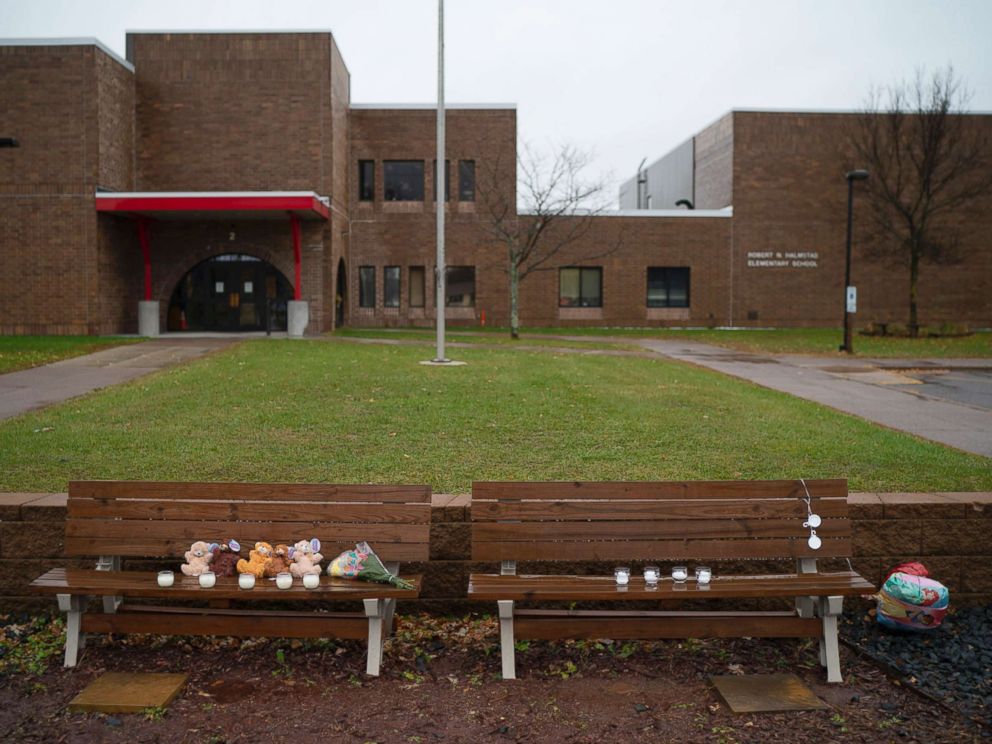 PHOTO: Teddy bears, flowers, and candles were placed on benches outside Halmstad Elementary School in Chippewa Falls, Wis. as a memorial to the three Girl Scouts who were struck and killed by a driver who fled the scene, Nov. 4, 2018.