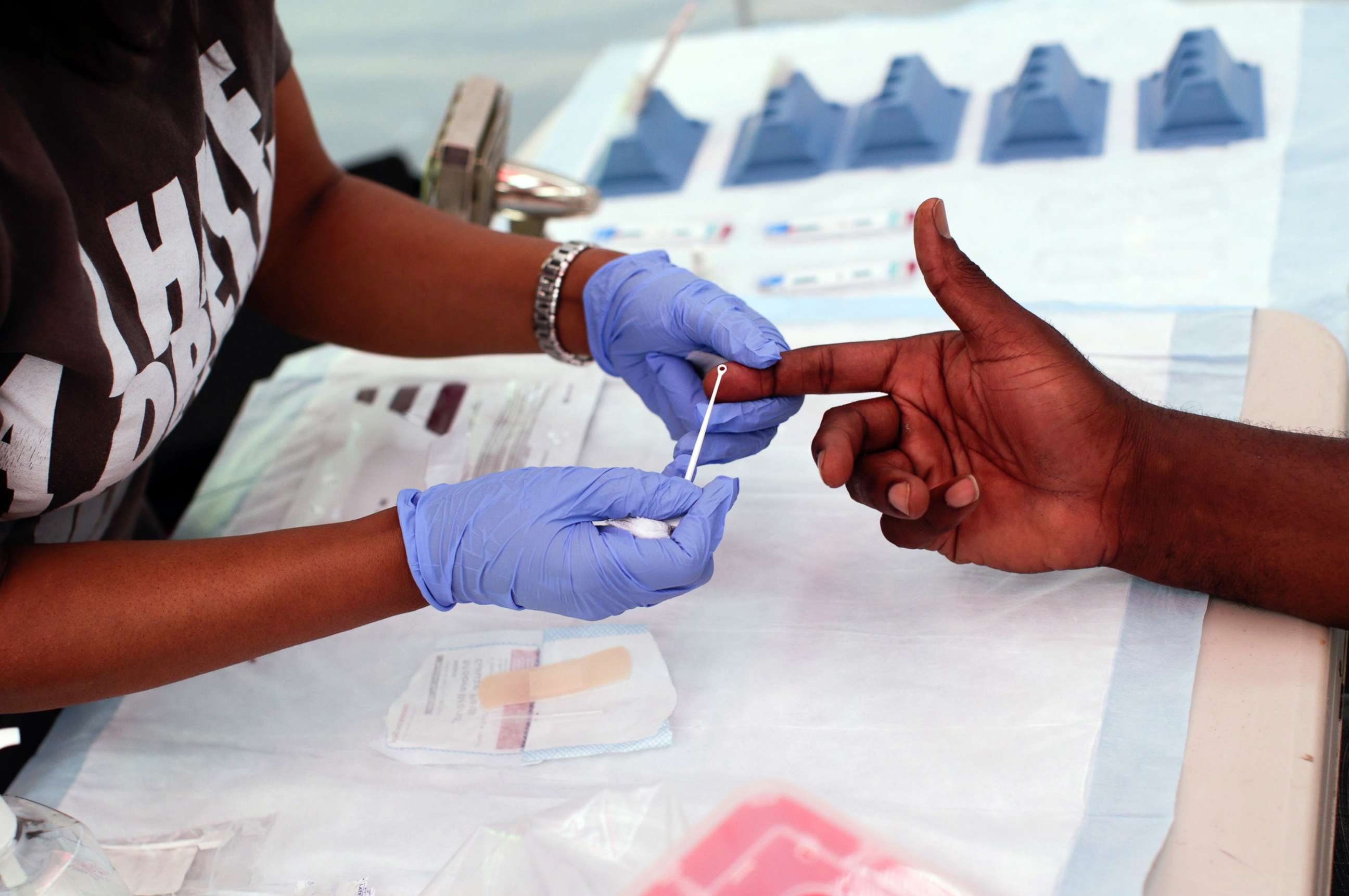 PHOTO: A man takes a free HIV test during the Harlem Pride parade in New York on June 29, 2019.