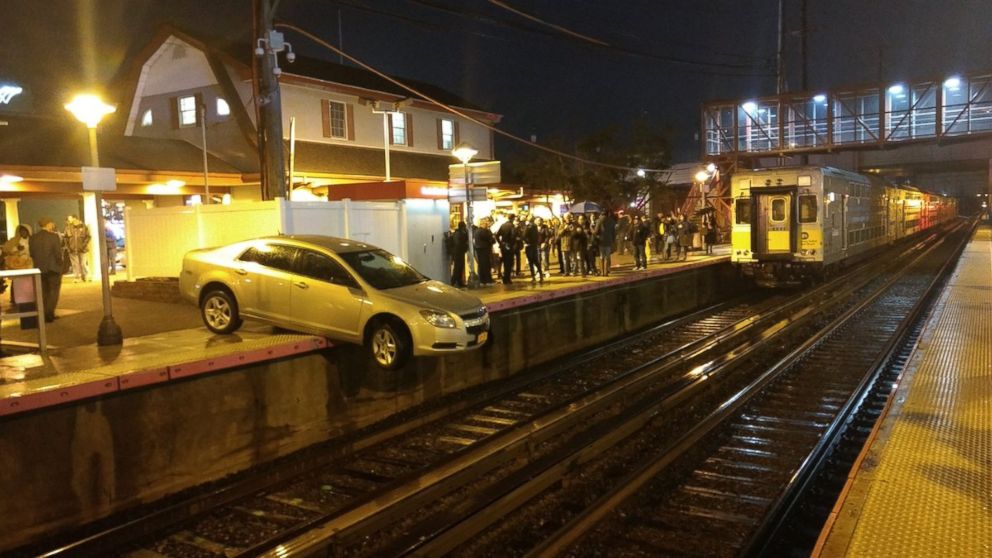 A driver ended up dangling off the LIRR platform in Mineola, N.Y. on Saturday, Nov. 18, 2017.