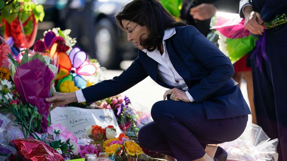 PHOTO: New York Gov. Kathy Hochul looks at a memorial at the scene of a shooting at a supermarket as she pays respects to the victims of Saturday's shooting in Buffalo, N.Y., Tuesday, May 17, 2022.