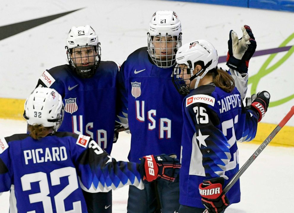 PHOTO: Michell Picard, Dani Cameranesi, Hilary Knight and Alex Carpenter of USA celebrate after scoring their team's first goal during the IIHF Women's Ice Hockey World Championships match between USA and Japan in Espoo, Finland, April 11, 2019.