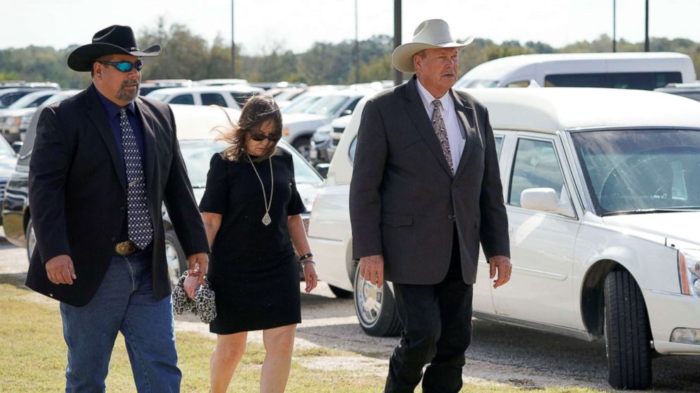 PHOTO: Wilson County Sheriff Joe Tackitt arrives with two others at a funeral for six members of the Holcombe family and three members of the Hill family, victims of the Sutherland Springs Baptist church shooting, in Floresville, Texas, Nov. 15, 2017.