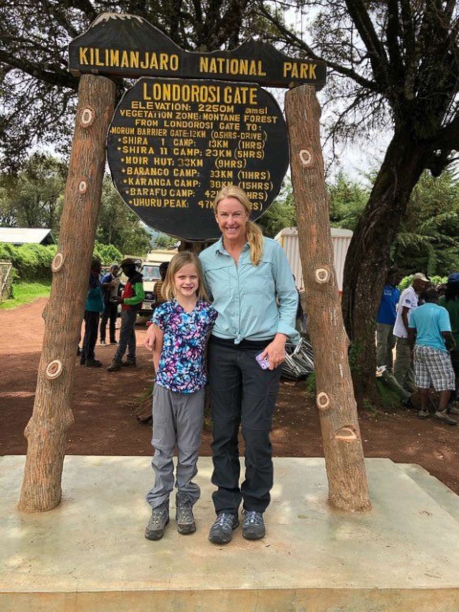 PHOTO: Hollie Kenney and her 7-year-old daughter, Montannah, pose before starting their climb on Mount Kilimanjaro.