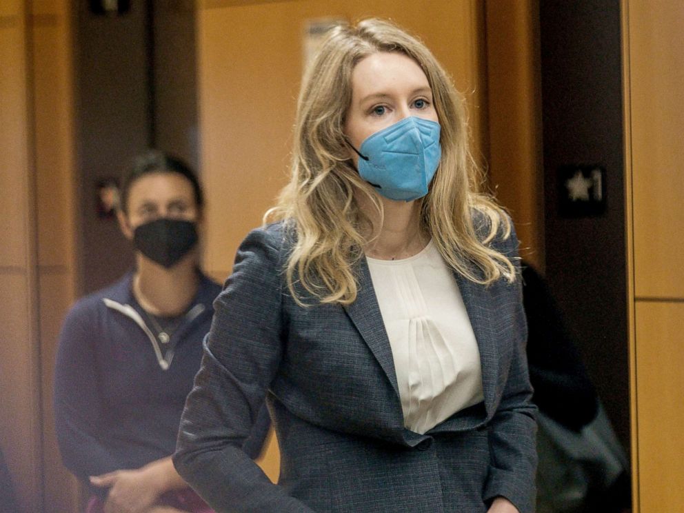PHOTO: Elizabeth Holmes, the founder and former CEO of blood testing and life sciences company Theranos, arrives for the first day of her fraud trial, outside Federal Court in San Jose, Calif., Sept. 8, 2021. 