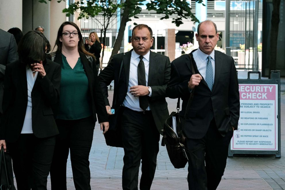 PHOTO: Former Theranos COO Ramesh "Sunny" Balwani and his legal team leave the Robert F. Peckham Federal Building, July 7, 2022, in San Jose, Calif.