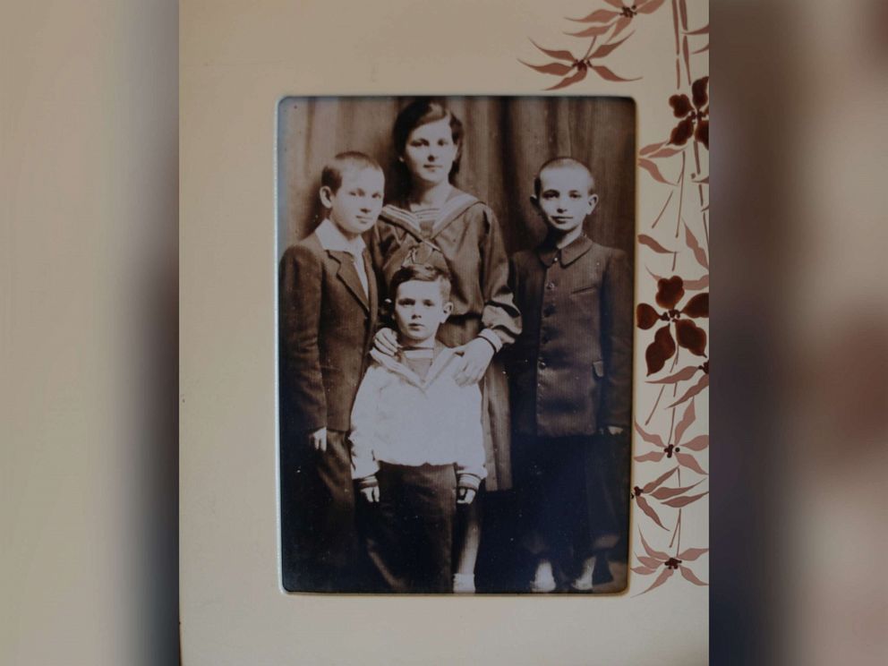 PHOTO: A childhood photo of Leon Sherman in Poland with his sister and two brothers.