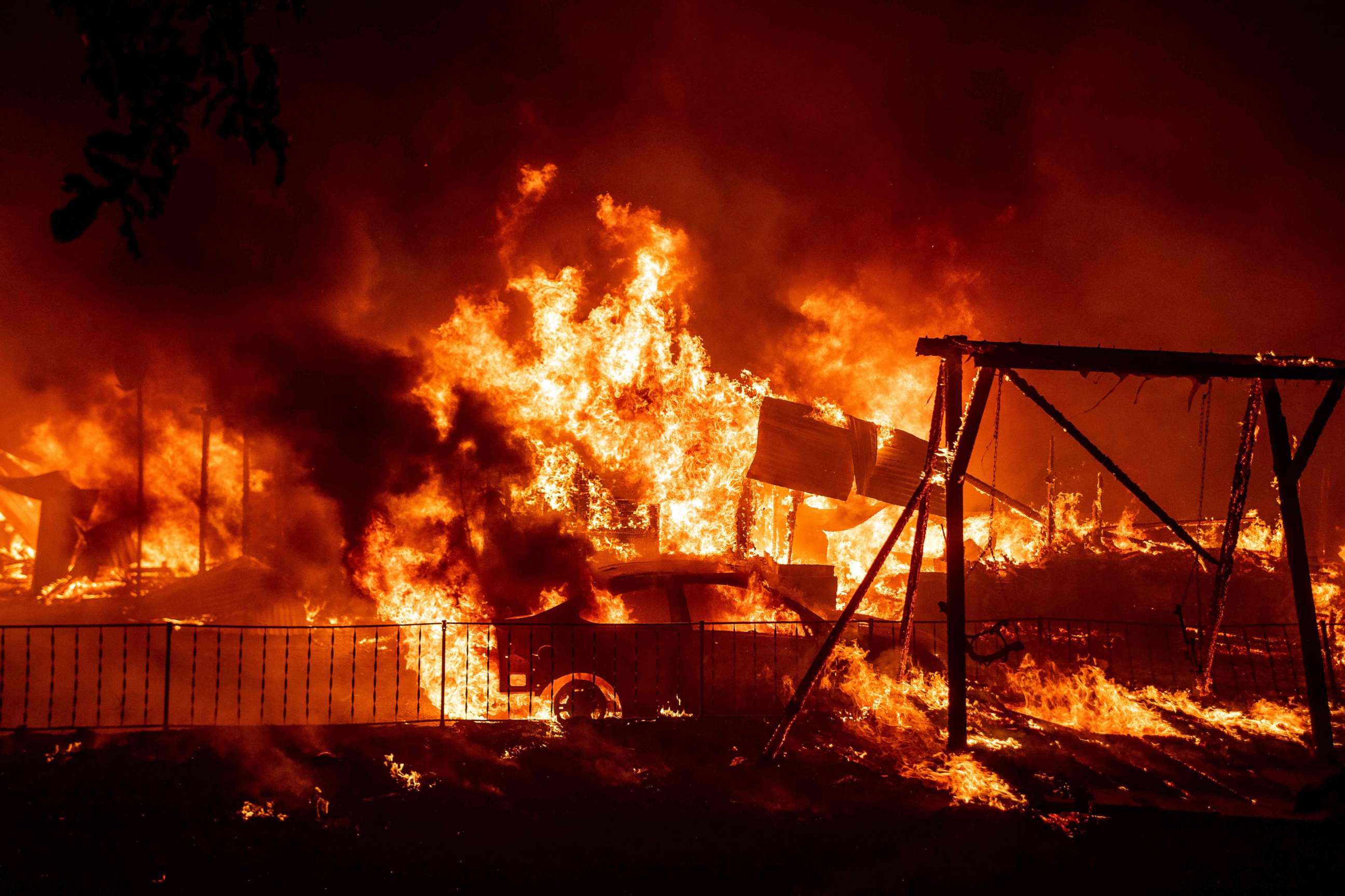 PHOTO: A home burns during the Bear fire, part of the North Lightning Complex fires in the Berry Creek area of unincorporated Butte County, California on Sept. 9, 2020.