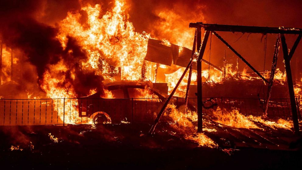 PHOTO: A home burns during the Bear fire, part of the North Lightning Complex fires in the Berry Creek area of unincorporated Butte County, California on Sept. 9, 2020.